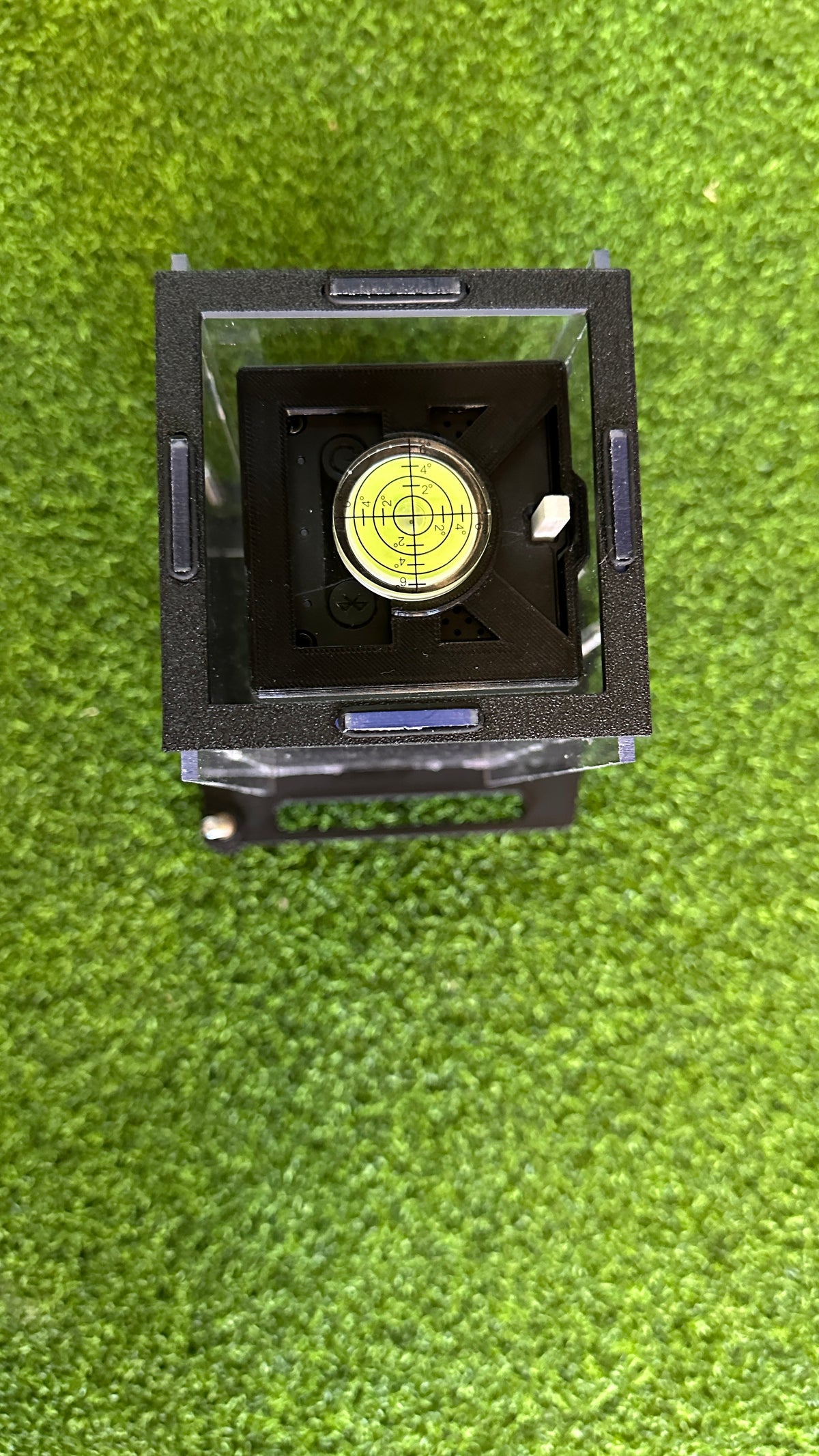 Top view of the Square Golf protective case showing the circular bubble level
