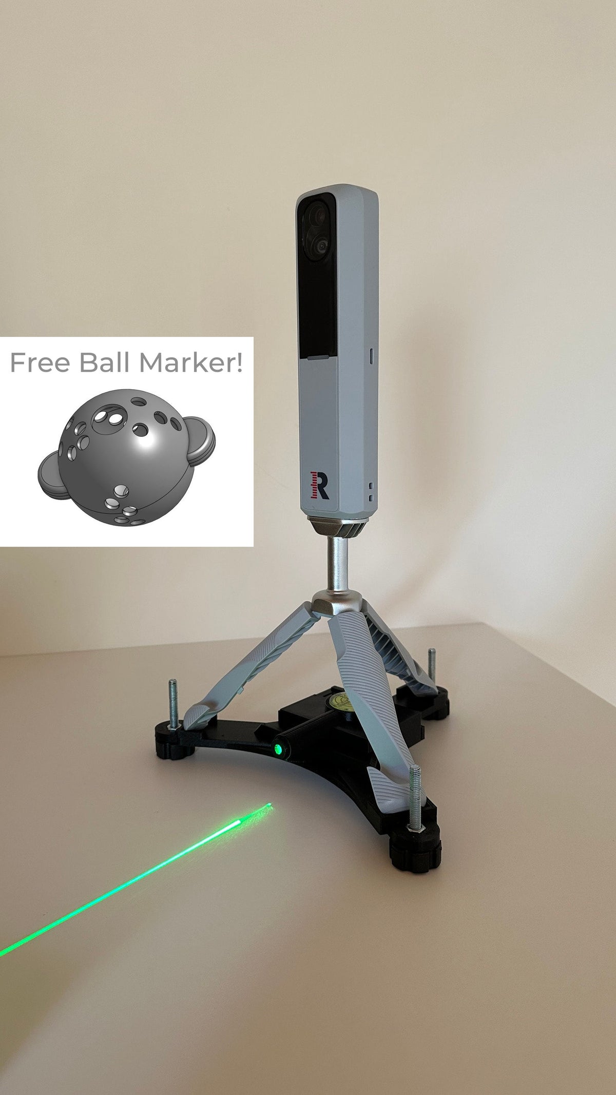 Rapsodo MLM2PRO on the leveling stand projecting a green laser line, with free ball marker illustration