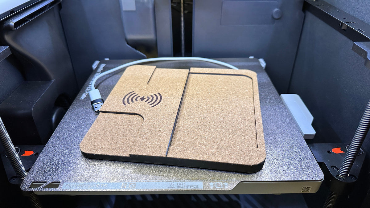 Close-up of the single charger on the printer build plate