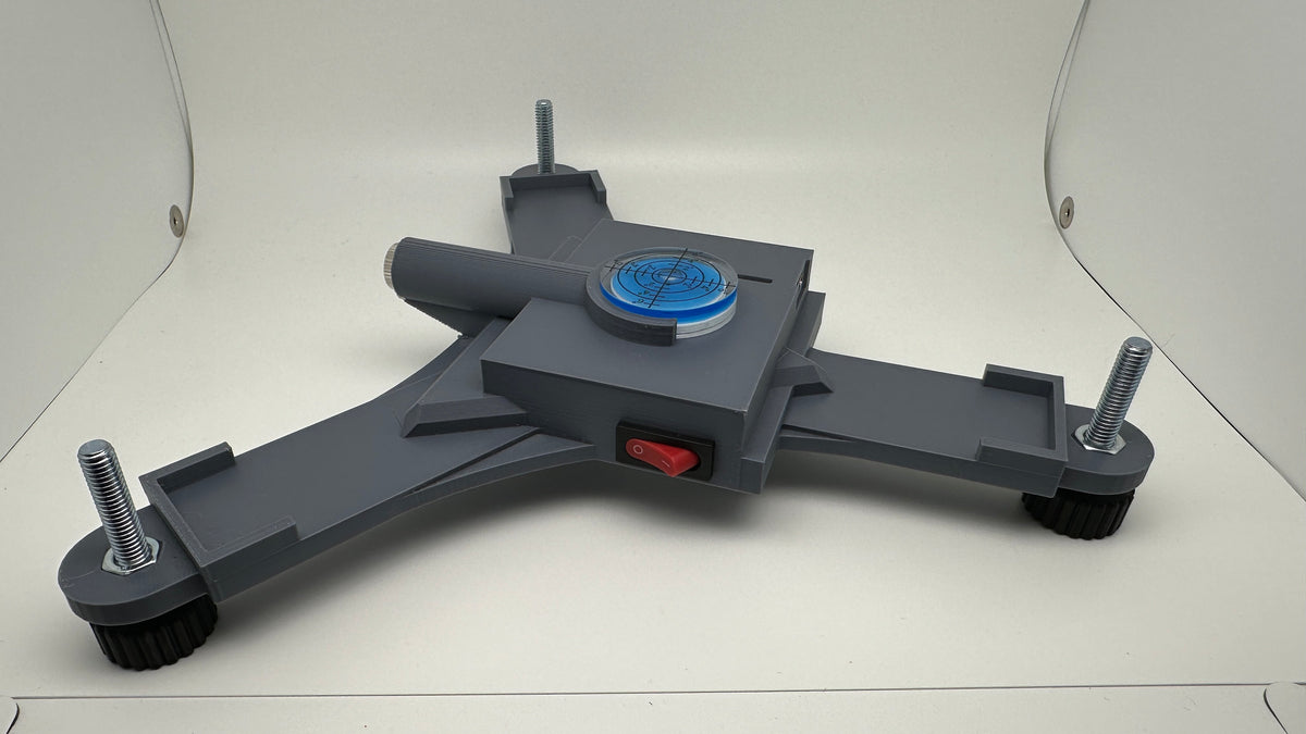 Rapsodo MLM2PRO rechargeable stand with blue bubble level and power switch