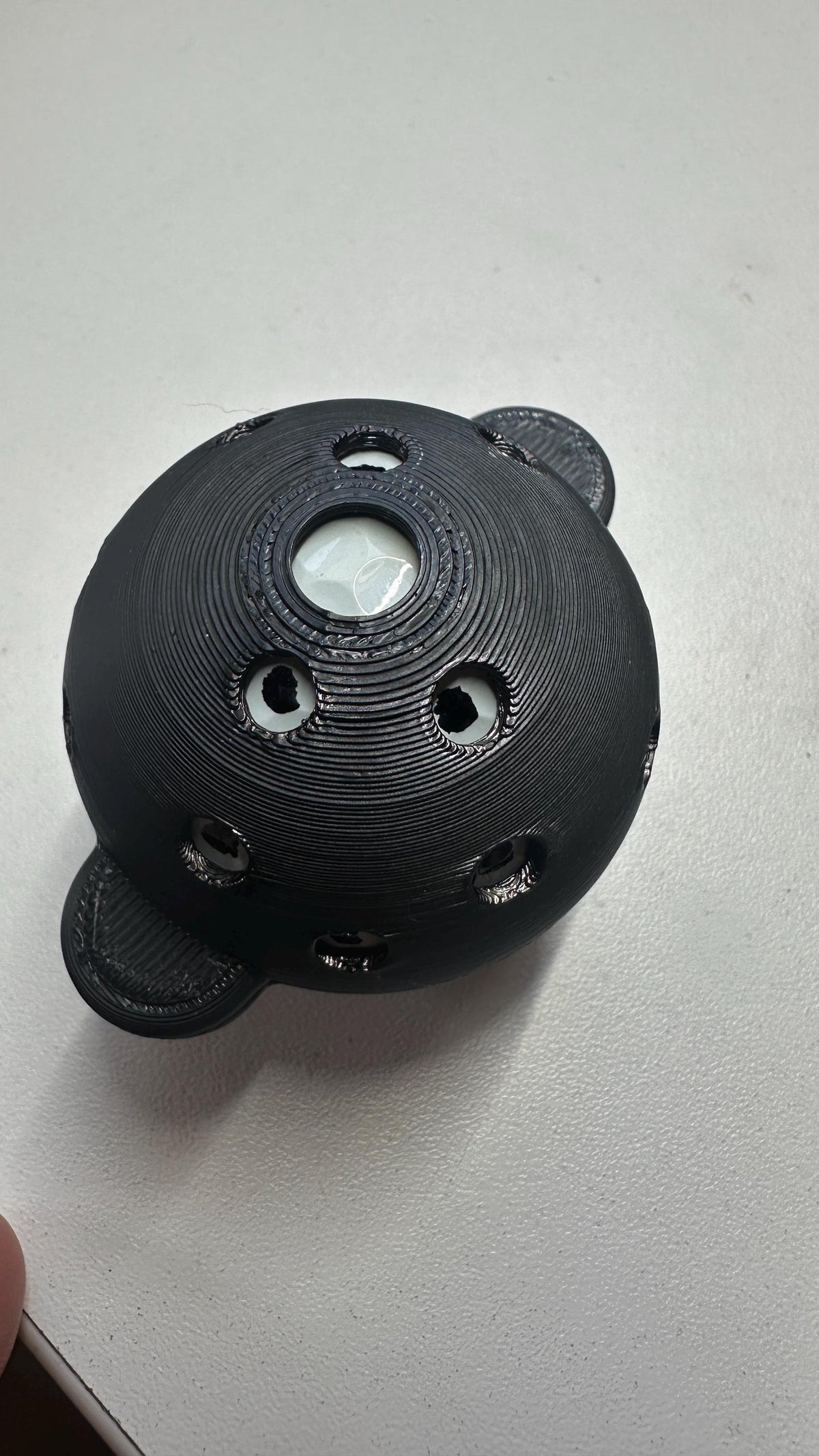 Close-up of the Square Golf ball marker guide openings