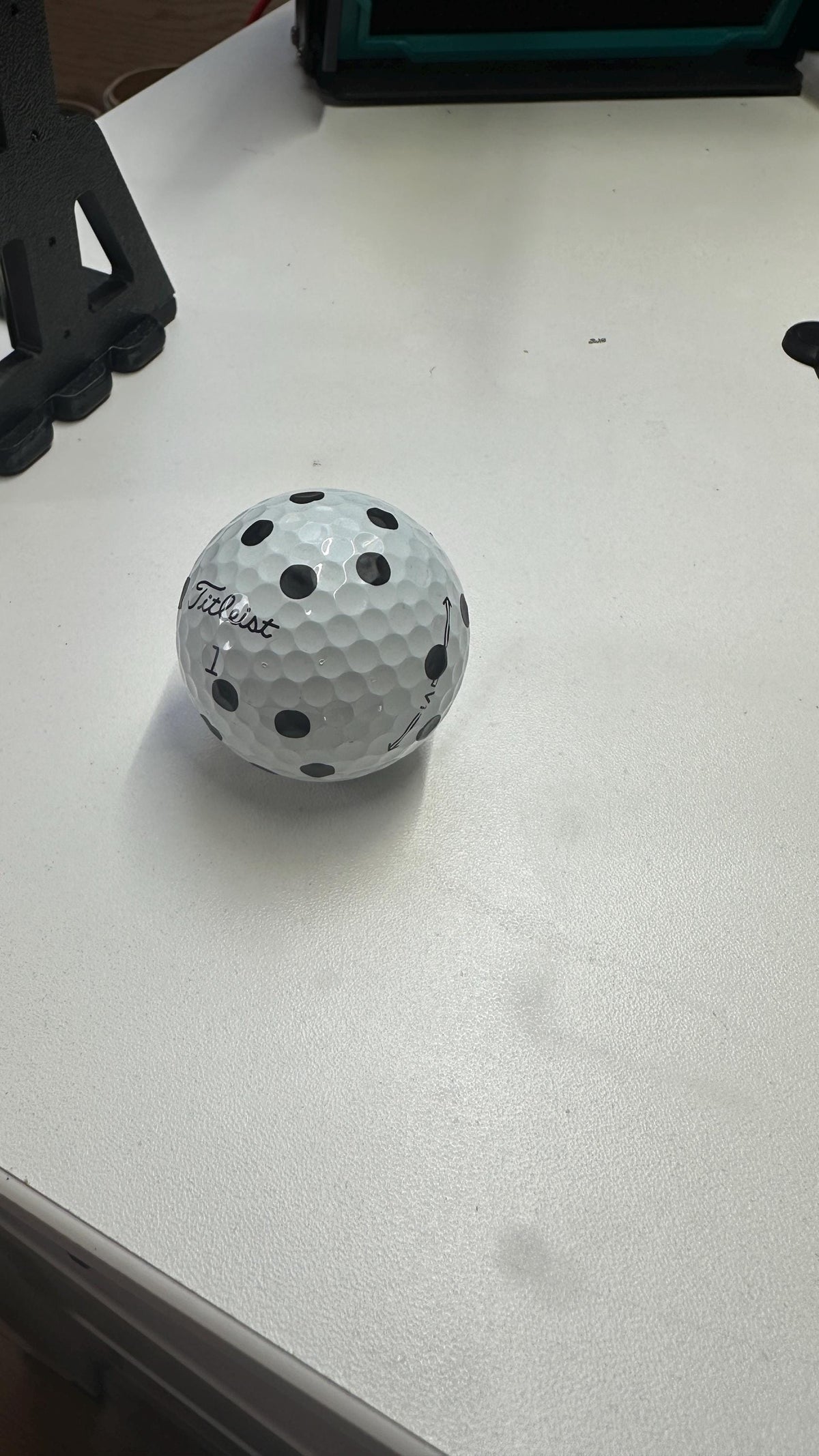 Marked golf ball shown as an example of the downloadable marker's result