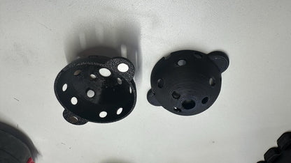 Two printed halves of the Square Golf ball marker