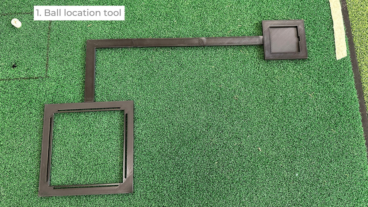 Square Golf ball positioning arm and frame on a hitting mat