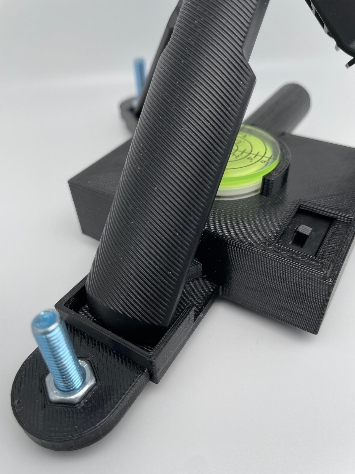Close-up of the Garmin R10 stand support and threaded leveling foot