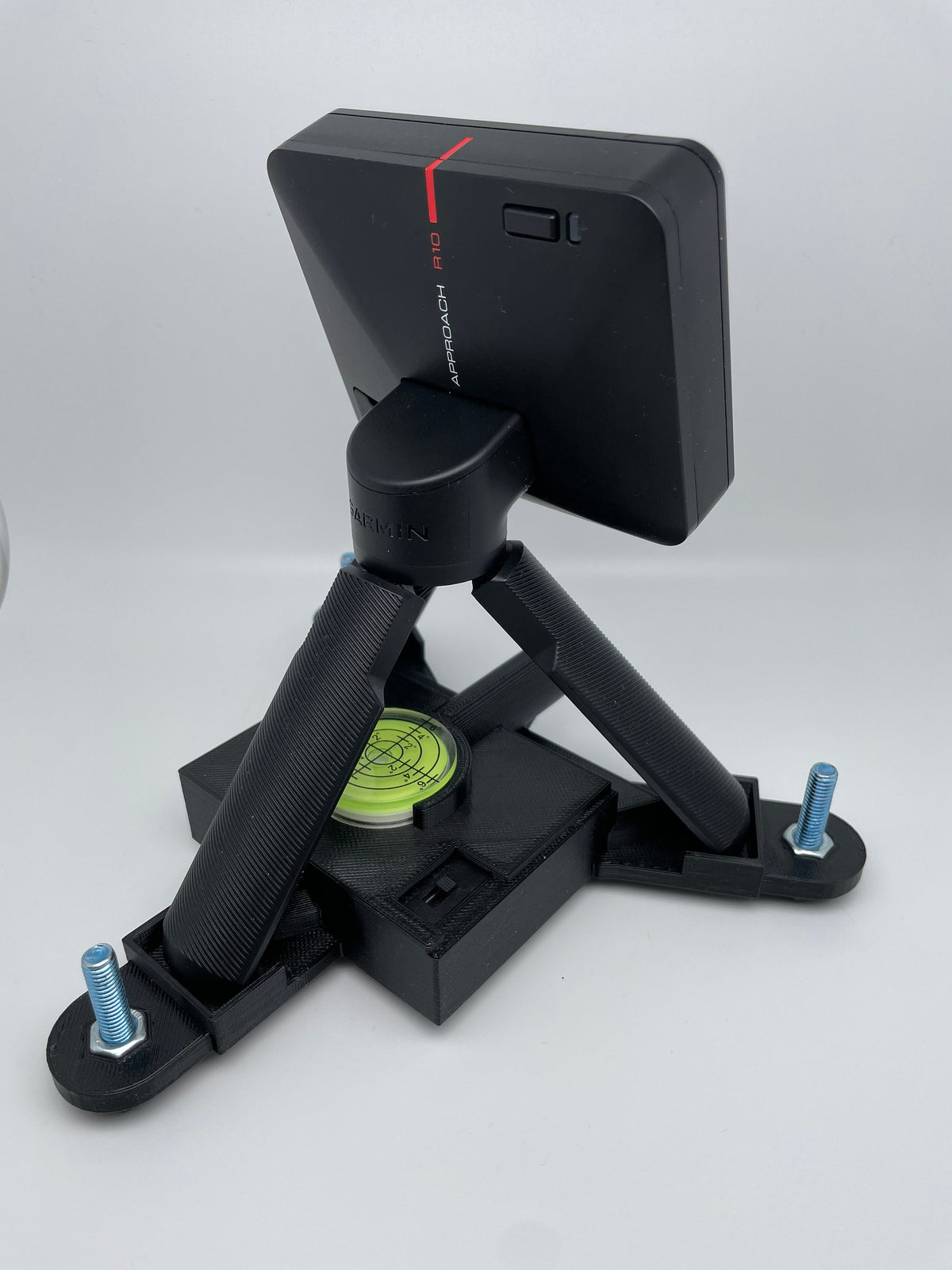 Rear view of Garmin Approach R10 on the leveling stand