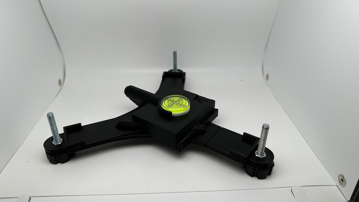 Side view of a printed Rapsodo MLM2PRO stand and three adjustable feet