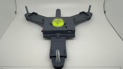 Printed example of the Rapsodo MLM2PRO rechargeable stand with yellow bubble level
