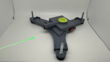 Assembled Rapsodo MLM2PRO rechargeable stand projecting a green laser line