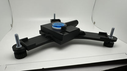 Side view of the Rapsodo MLM2PRO stand with blue bubble level and laser housing