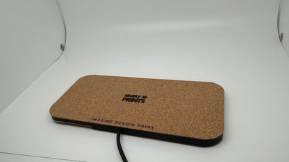 Reverse side of the cork-finished charger showing the Simply 3D Prints logo
